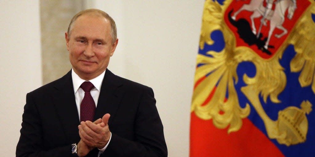 Russian President Vladimir Putin applauds during the State Awards Ceremony at the Grand Kremlin Palace in Moscow, Russia, June,12,2019