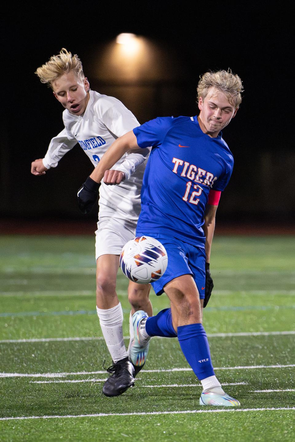 Bromfield's Conor Glew and Douglas's Chris Dame battle for possesion during a MIAA D5 state semifinal on Wednesday November 15, 2023 in Ayer.