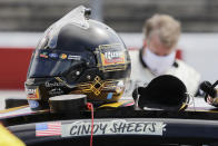 The name of Cindy Sheets covers the name of driver Clint Bowyer before the NASCAR Cup Series auto race Sunday, May 17, 2020, in Darlington, S.C. The names of health care workers across the country have been substituted for the drivers' name above the door on each of the 40 cars. (AP Photo/Brynn Anderson)