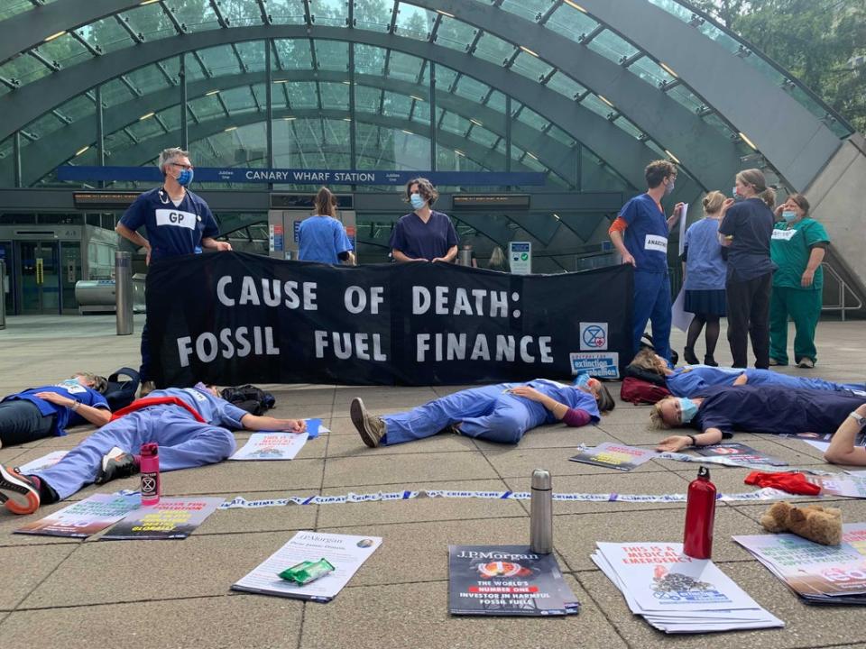 Doctors lay ‘dead’ in front of Canary Wharf tube station (The Independent)