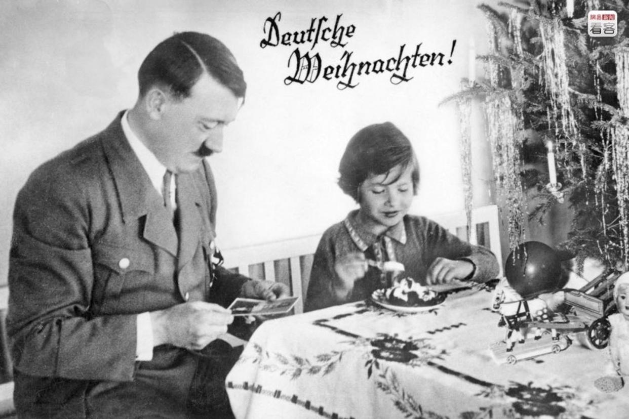 <span class="caption">A postcard depicts Adolf Hitler posing with a child and a Christmas tree. </span> <span class="attribution"><span class="license">Author provided</span></span>