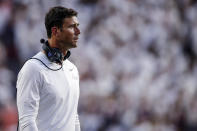 Akron coach Tom Arth walks near the sideline after a score by Auburn during the first half of an NCAA college football game Saturday, Sept. 4, 2021, in Auburn, Ala. (AP Photo/Butch Dill)