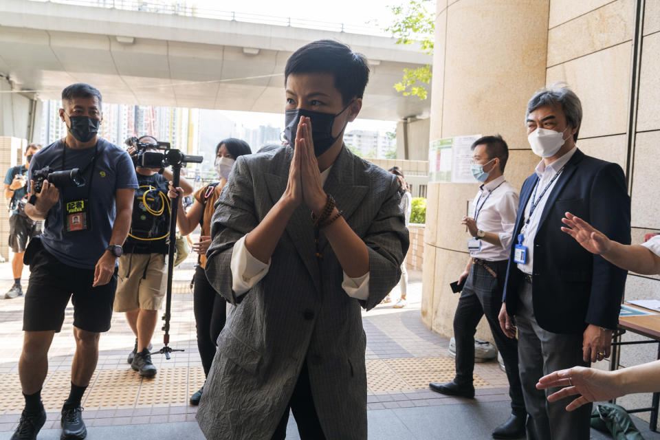 Hong Kong singer and activist Denise Ho arrives at the West Kowloon Magistrates' courts in Hong Kong, Monday, Sept. 26, 2022. A 90-year-old Catholic cardinal and five others including Ho stood trial in Hong Kong on Monday for allegedly failing to register a now-defunct fund set up to assist people arrested in the mass anti-government protests in the city three years ago. (AP Photo/Oiyan Chan)