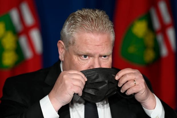 Ontario Premier Doug Ford after speaking at a news conference in Toronto on Friday. Ontario is extending its stay-at-home order to six weeks, restricting interprovincial travel and limiting outdoor gatherings in an effort to stem COVID-19 cases.