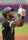 Chicago White Sox's Tim Anderson celebrates after hitting a solo home run in the first inning in the first baseball game of a doubleheader against the Cleveland Indians, Thursday, Sept. 23, 2021, in Cleveland. (AP Photo/Tony Dejak)