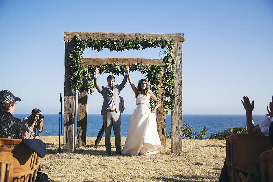 Ligaya and Russel cheer after they’re pronounced husband and wife.