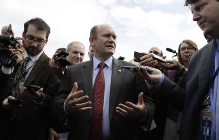 U.S. Senator Chris Coons (D-DE) talks to reporters after being briefed with other members of the Senate on North Korea at the White House in Washington, U.S, April 26, 2017. REUTERS/Kevin Lamarque