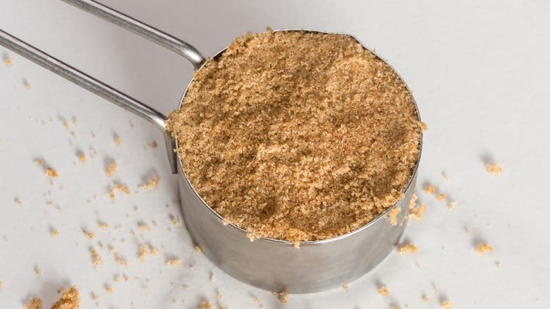 Packed brown sugar in measuring cup