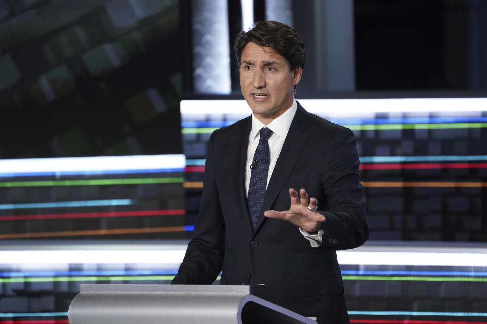 FILE - Liberal leader Justin Trudeau makes a point during the federal election French-language leaders debate, Wednesday, Sept. 8, 2021, in Gatineau, Quebec. Trudeau called the early election for Monday, Sept. 20 in hopes of winning a majority of seats in Parliament, but has faced criticism for calling a vote during a pandemic in order to cement his hold on power. (Sean Kilpatrick/The Canadian Press via AP)