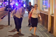 <p>People run down Borough High Street as police are dealing with a “major incident” at London Bridge. (Dominic Lipinski/PA Images via Getty Images) </p>