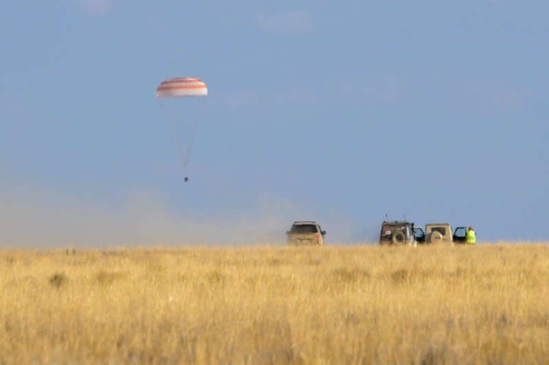 The Soyuz MS-23 spacecraft is seen as it lands in a remote area near the town of Zhezkazgan, Kazakhstan. Photo by Bill Ingalls/NASA