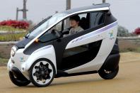 <p>Building a tandem seater car is a good way to stand out from the crowd, but Toyota went much further with its i-Road at the 2013 Geneva Motor Show. As well as the 1+1 seating design, the i-Road was a mere 90cm wide, making it as narrow as most motorcycles. This was to give the car city-busting manoeuvrability and it also had leaning suspension like a motorbike’s to aid stability.</p><p>Inside, the cabin was slung for two but quiet thanks to electric power that gave a range of up to <strong>30 miles</strong> on a single charge. Toyota planned to let the residents of Grenoble in France use the i-Road as part of a vehicle sharing experiment. The i-Road made up part of a 70-strong fleet of electric vehicles used in the three-year study.</p>