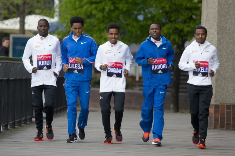 (L-R) Elite runners, Kenyan Abel Kirui, Ethiopian Feyisa Lilesa, Eritrean Ghirmay Ghebreslassie, Kenyan Bedan Karoki Muchiri and Ethiopian Kenenisa Bekele ahead of the London Marathon