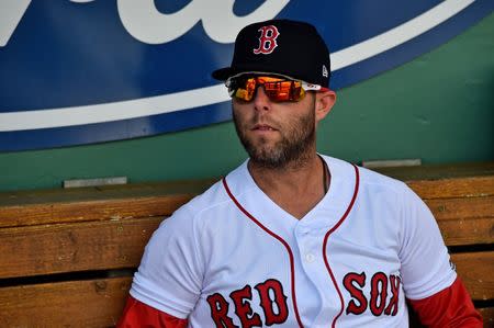 FILE PHOTO: Mar 9, 2019; Fort Myers, FL, USA; Boston Red Sox second baseman Dustin Pedroia (15) looks on from the dugout prior to the spring training game against the New York Mets at JetBlue Park. Mandatory Credit: Jasen Vinlove-USA TODAY Sports