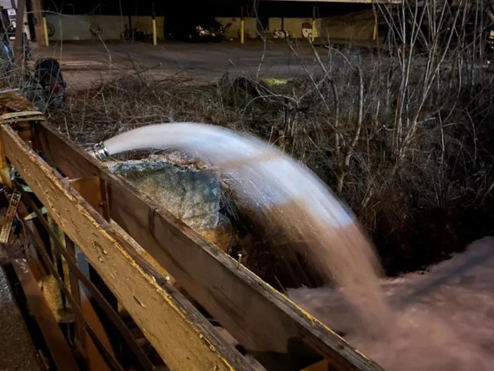 Air-stripping devices, like this one used after the derailment, can help separate chemicals from water. <a href=