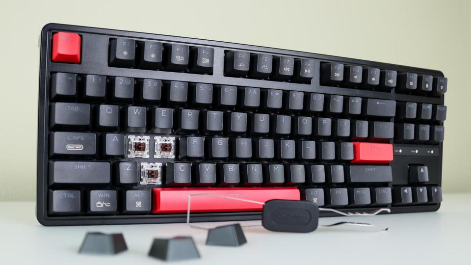  The Keychron C3 Pro keyboard on a desk with several keycaps removed. 