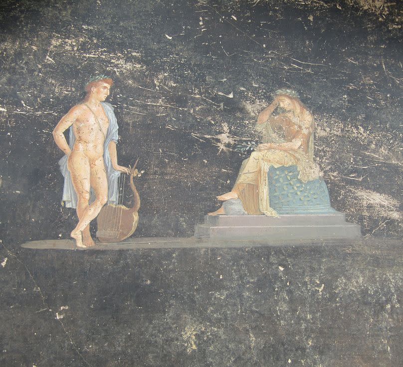 Apollo and Cassandra depicted on a frescoes inside the Pompeii banquet hall