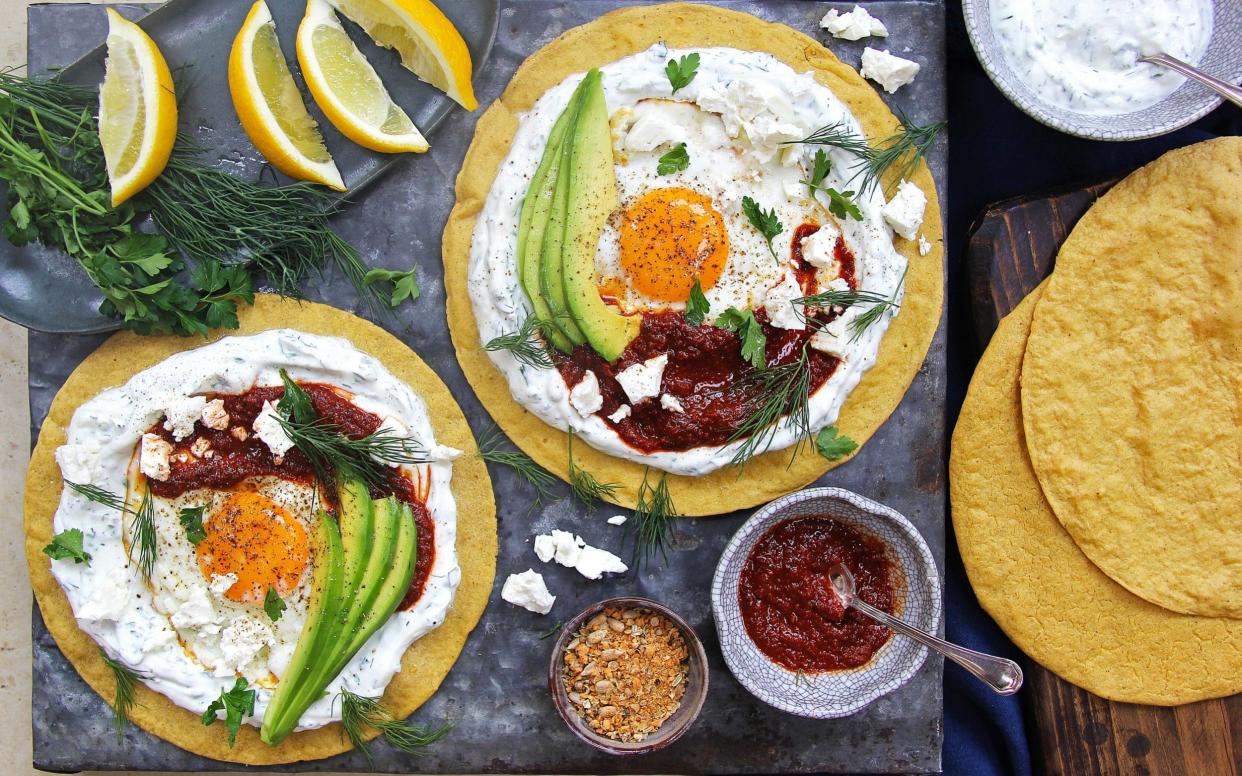 Socca flatbreads with herb yogurt, harissa, feta and fried eggs