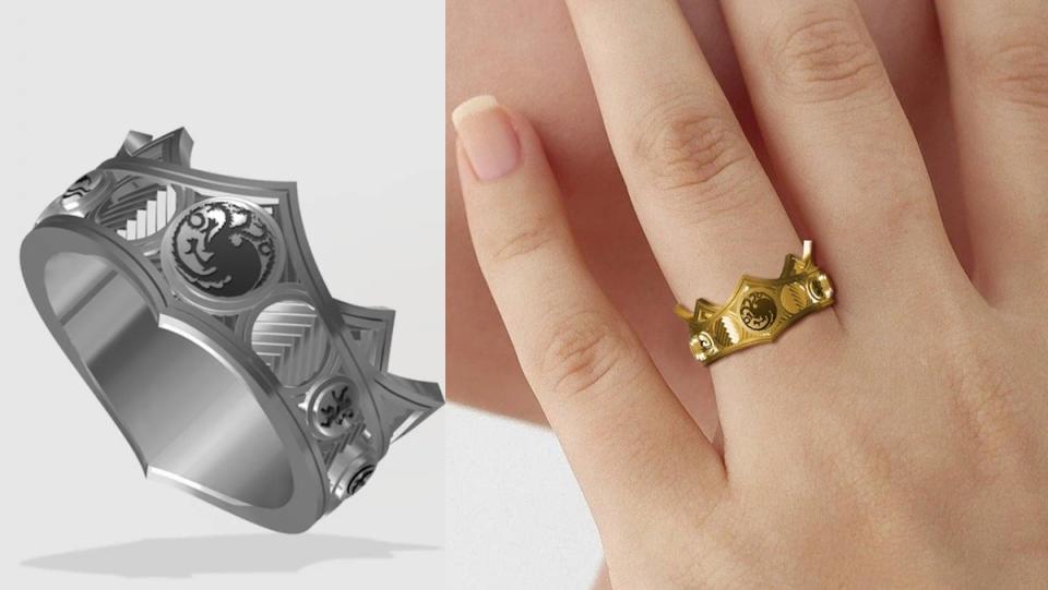 A silver Viserys House of the Dragon crown ring next to a gold one on a hand