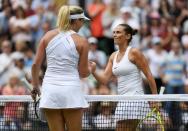 Britain Tennis - Wimbledon - All England Lawn Tennis & Croquet Club, Wimbledon, England - 3/7/16 USA's Coco Vandeweghe shakes hands with Italy's Roberta Vinci after winning their match REUTERS/Tony O'Brien