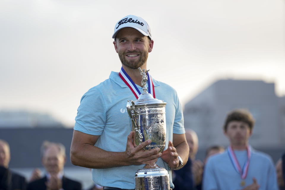 Wyndham Clark holds the holds the trophy after winning the U.S. Open golf tournament at Los Angeles Country Club on Sunday, June 18, 2023, in Los Angeles. (AP Photo/George Walker IV)