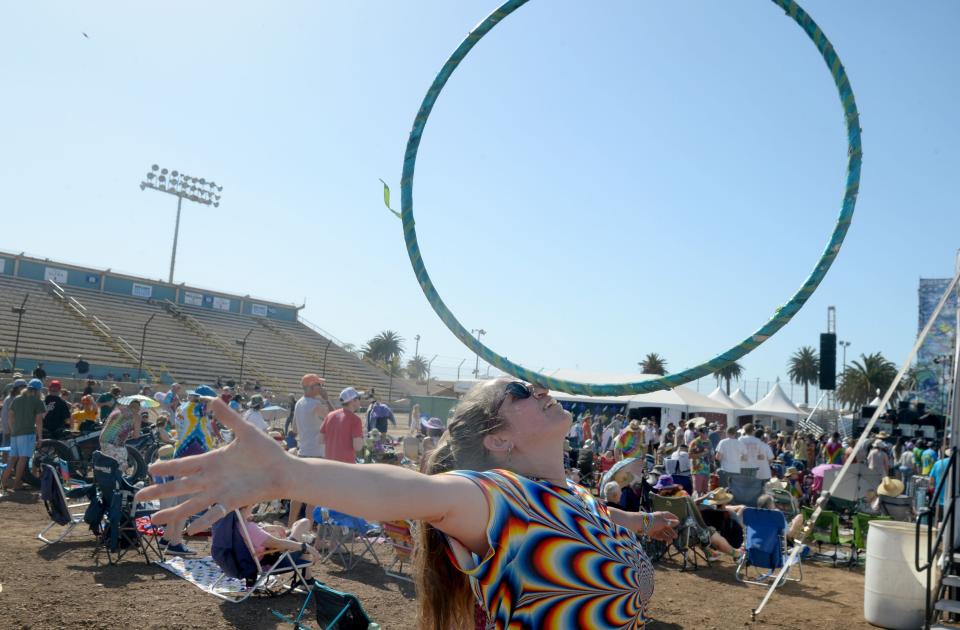 Esther Rorin dances with a hula hoop at the annual Skull & Roses, Grateful Dead tribute festival at the Ventura County Fairgrounds in April 2022. This year's event was canceled on Tuesday.