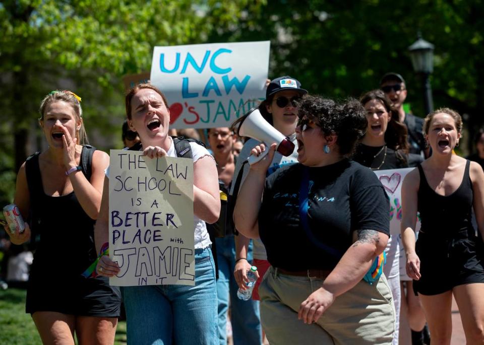 A group marches through the UNC-Chapel Hill quad during a rally on Thursday, April 13, 2023, in support of Jamie Marsicano, a student at the UNC School of Law.