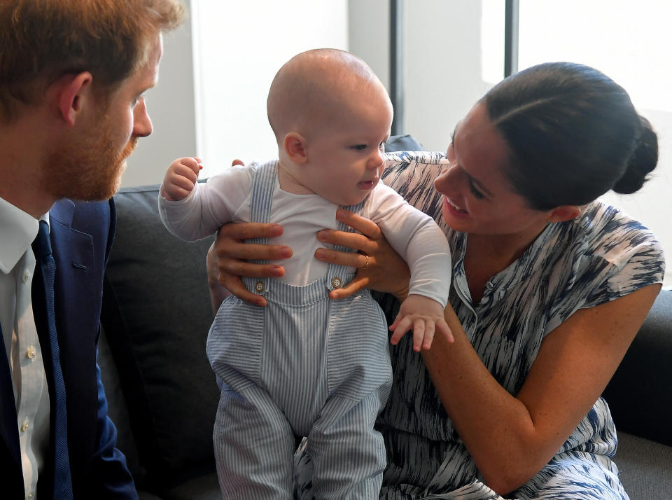 Britain's Prince Harry and his wife Meghan, Duchess of Sussex, holding their son Archie, meet Archbishop Desmond Tutu (not pictured) at the Desmond & Leah Tutu Legacy Foundation in Cape Town, South Africa, September 25, 2019. REUTERS/Toby Melville/Pool