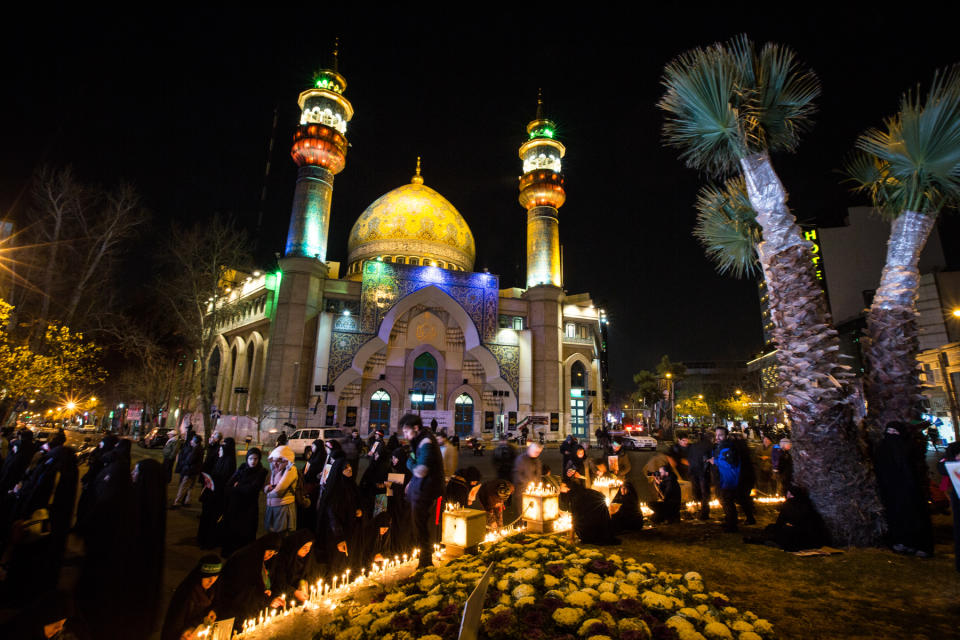 People of Iran in various parts of the country, especially the people of the Iranian capital, lit candles and mourned the night of General Qasem Soleimani's burial, in Tehran, Iran, on June 7, 2019. Mourners packed the streets of Tehran for ceremonies to pay homage to Soleimani, who spearheaded Iran's Middle East operations as commander of the Revolutionary Guards' Quds Force and was killed in a US drone strike on January 3 near Baghdad airport. (Photo by Hamid Vakili/NurPhoto via Getty Images)