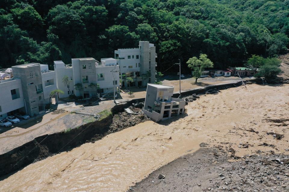 A building is swept down in the aftermath of Typhoon at a village in Pohang (AP)