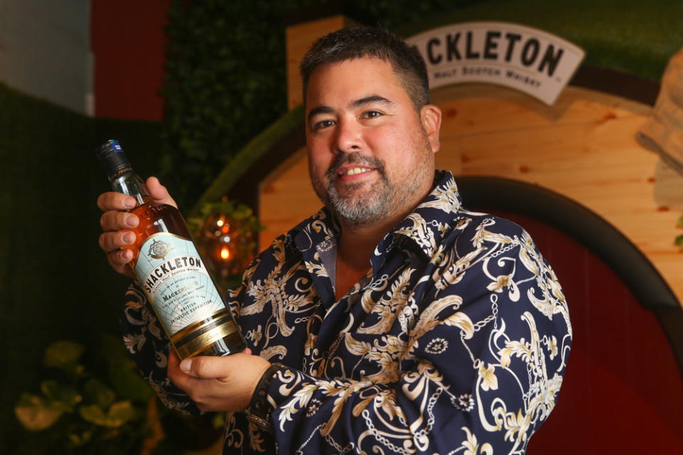 Luen Heng’s Sean Soh posing with a bottle of Shackleton’s Blended Malt Scotch Whisky at the launch. — Picture by Choo Choy May