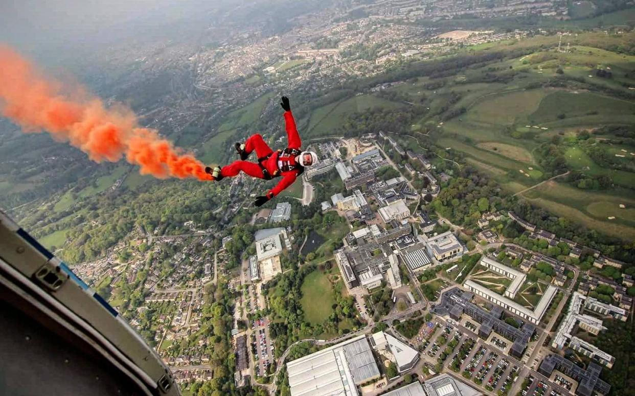 The peppercorn rent paid by the University of Bath was delivered by parachute this year  - SWNS