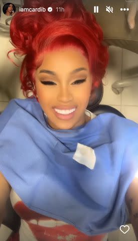 Cardi B shows off fiery new red pixie hairstyle while rapping