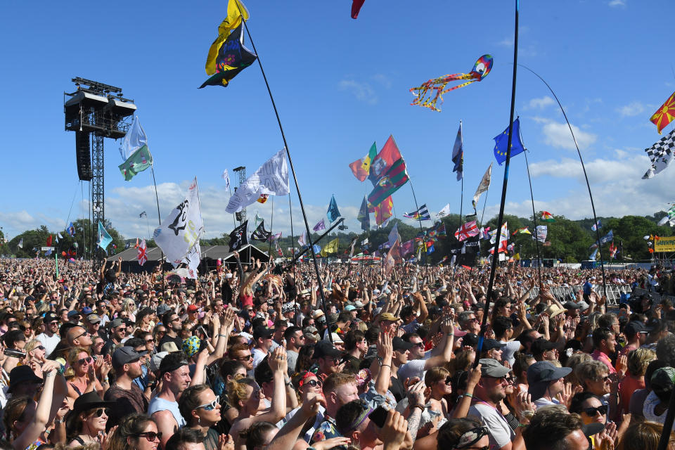 GLASTONBURY, ENGLAND - JUNE 30: The crowd watch Miley Cyrus performs on the Pyramid stage during day five of Glastonbury Festival at Worthy Farm, Pilton on June 30, 2019 in Glastonbury, England. (Photo by Dave J Hogan/Getty Images)