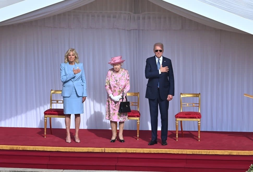  Queen Elizabeth II (C), US President Joe Biden (R) and US First Lady Dr Jill Biden (L) at Windsor Castle on June 13, 2021 in Windsor, England. Queen Elizabeth II hosts US President, Joe Biden and First Lady Dr Jill Biden at Windsor Castle. The President arrived from Cornwall where he attended the G7 Leader's Summit and will travel on to Brussels for a meeting of NATO Allies and later in the week he will meet President of Russia, Vladimir Putin. 