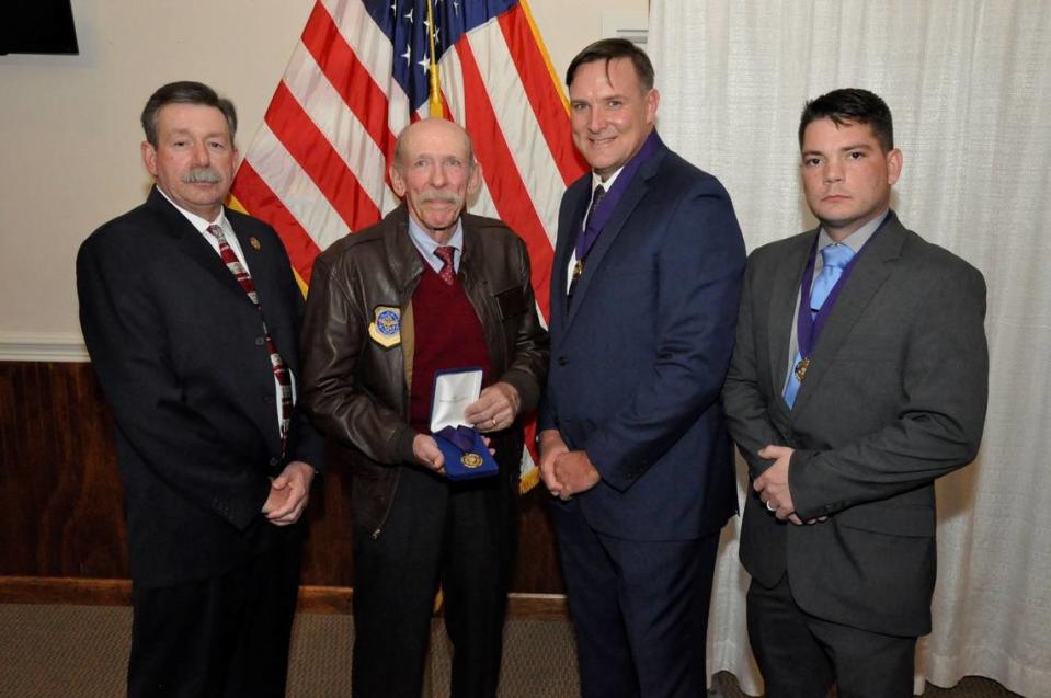 Sgt. Randy Clinton, Det. Mike Doty’s father Bob Doty, Sgt. Buddy Brown and Sgt. Kyle Cummings accepted York County Sheriff’s Office Purple Heart awards Jan. 31.