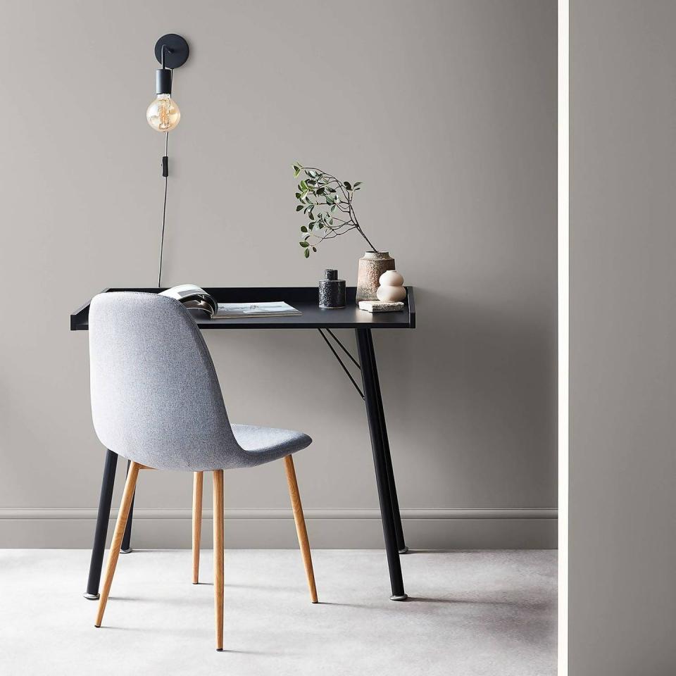 <p>If you're creating a WFH space, and need colours to help you concentrate, greige is a great choice. In colour psychology, grey represents neutrality and balance, and can encourage focus, whilst beige is said to be calming and relaxing.<br></p><p>Pictured: <a href="https://www.homebase.co.uk/house-beautiful-durable-matt-emulsion-multi-surface-paint-mono-tones-mt.05-tester-125ml/13419408.html" rel="nofollow noopener" target="_blank" data-ylk="slk:House Beautiful Durable Mono Tones MT.05 Paint at Homebase;elm:context_link;itc:0;sec:content-canvas" class="link ">House Beautiful Durable Mono Tones MT.05 Paint at Homebase</a></p>