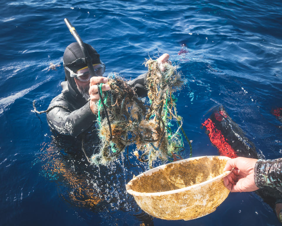 Ben Lecomte finds a rice strainer and net in the trash vortex. Source: @Osleston