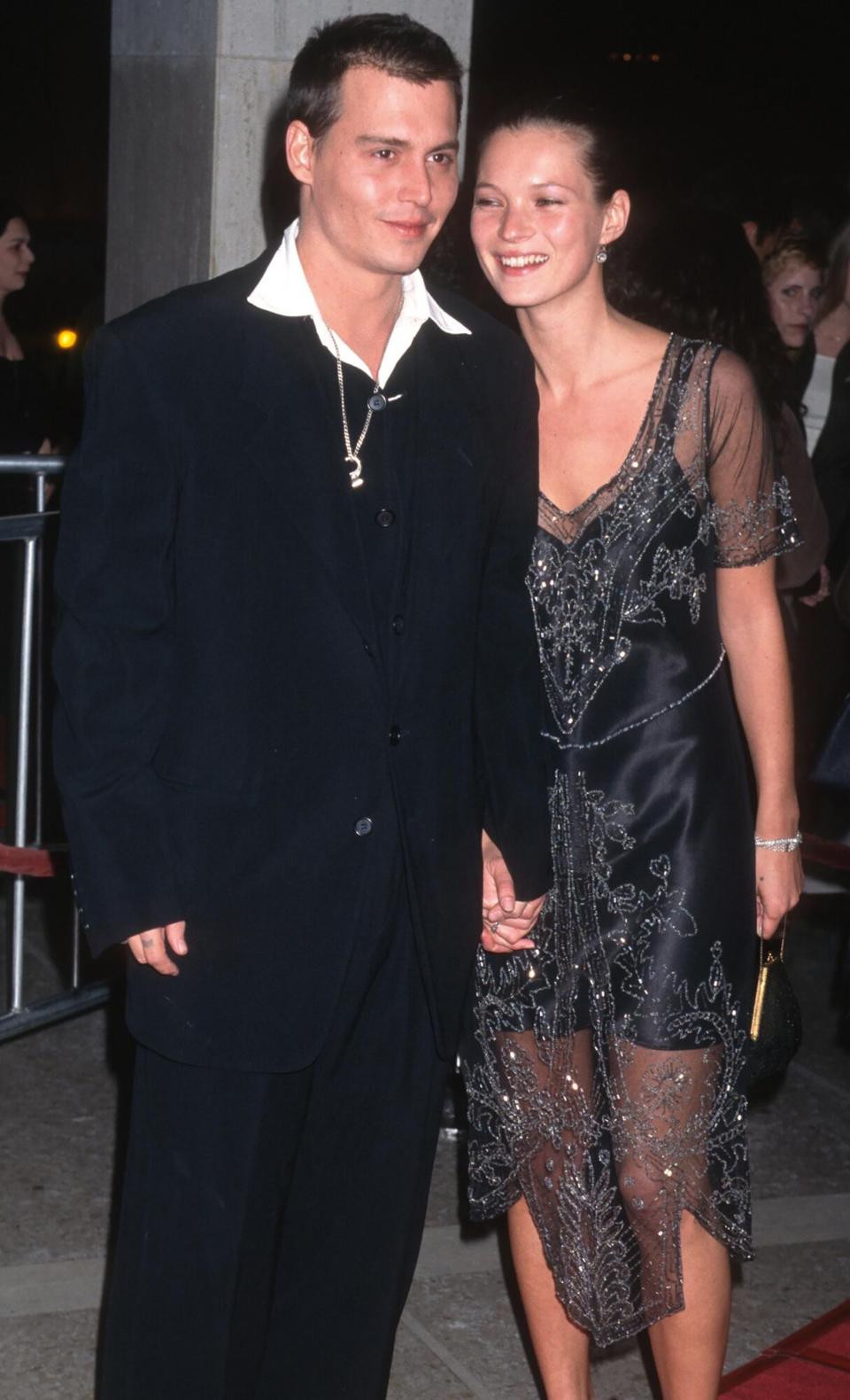 Johnny Depp and fashion model Kate Moss, attend the premiere of 'Donnie Brasco' at the Cineplex Odeon Cinema, Century City, California, March 24, 1997