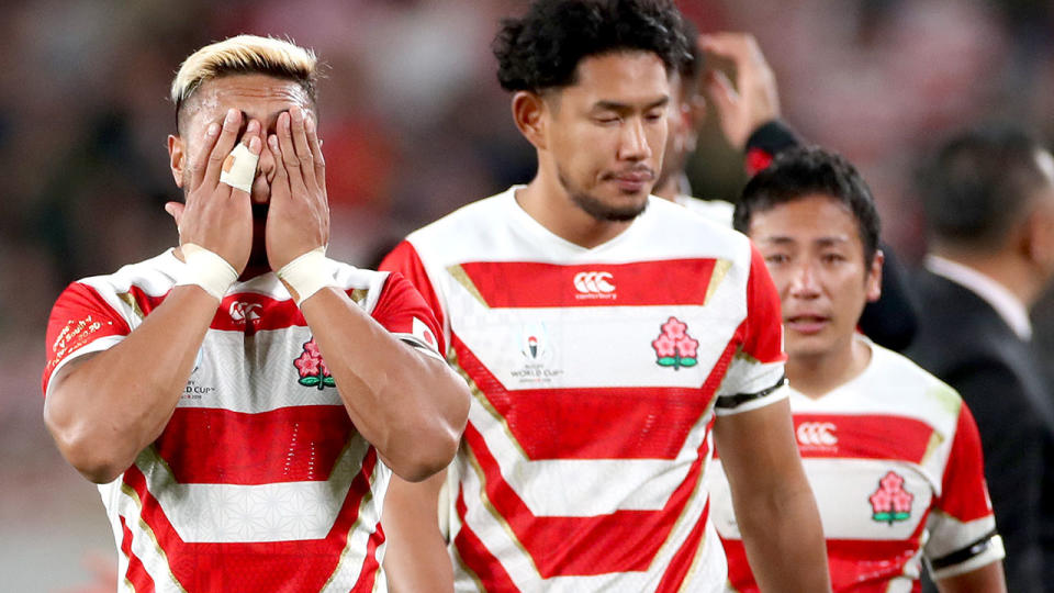 Japanese players, pictured here after their quarter-final loss to South Africa.