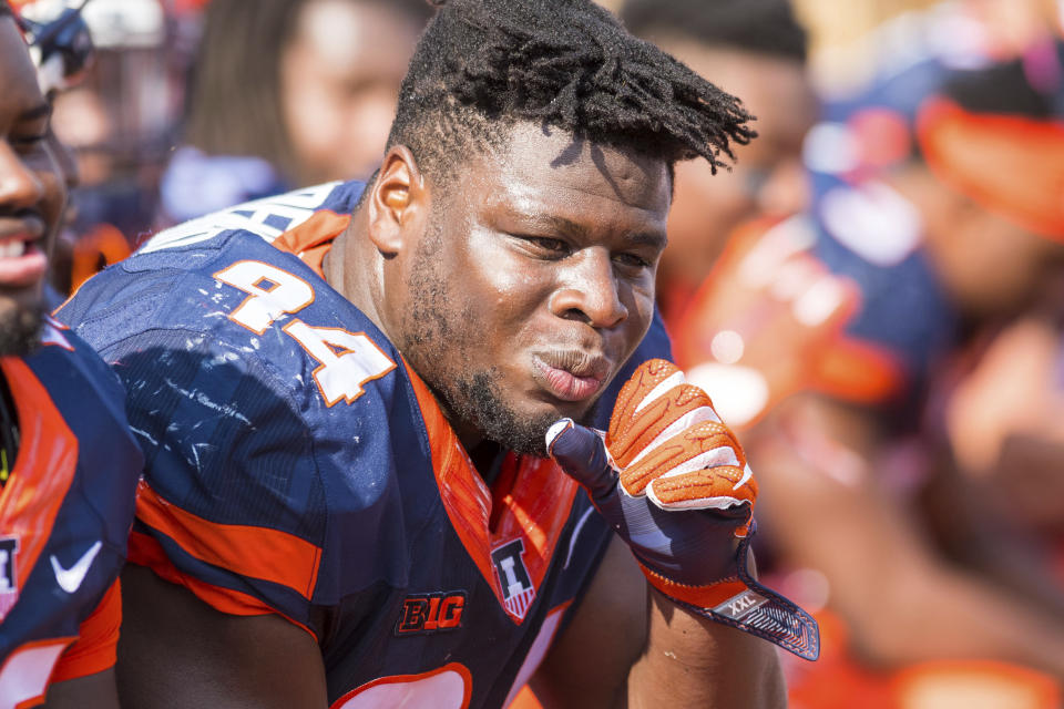 Illinois defensive lineman Tito Odenigbo (94) sits on the bench during an NCAA college football game against Rutgers Saturday, Oct. 14, 2017 at Memorial Stadium in Champaign, Ill. Rutgers defeated Illinois 35-24. (AP Photo/Bradley Leeb)