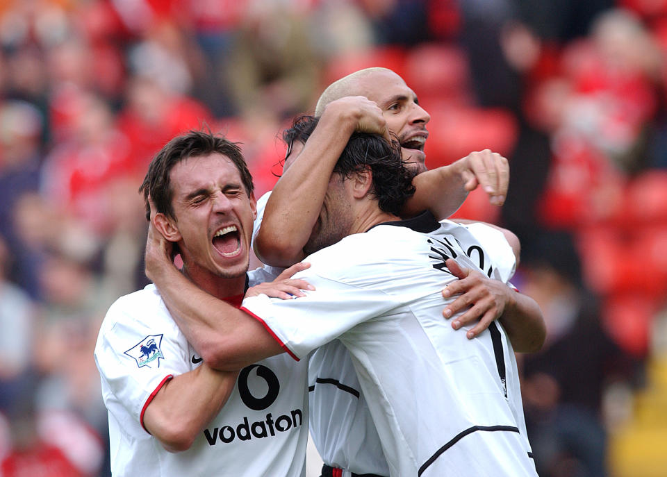 LONDON - SEPTEMBER 28:  Ruud van Nistelrooy celebrates after scoring with Gary Neville and Rio Ferdinand during the FA Barclaycard Premiership match between Charlton Athletic v Manchester United at The Valley on September 28, 2002 in London. Charlton Athletic 1 Manchester United 2.  (Photo by John Peters/Manchester United via Getty Images)