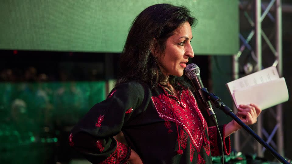 Susan Abulhawa, a Palestinian-American writer and human rights activist,  speaks at a 2014 Palestine Festival of Literature event at Qasr al Qassem on June 4, 2014 in Beit Wazan, near Nablus, West Bank. - Rob Stothard/Getty Images