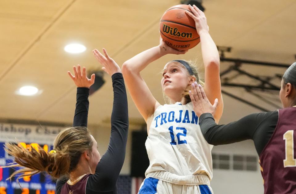 Bishop Chatard Trojans Olivia Berzai (12) shoots the ball Tuesday, Jan. 30, 2024, during the game at Bishop Chatard High School in Indianapolis.