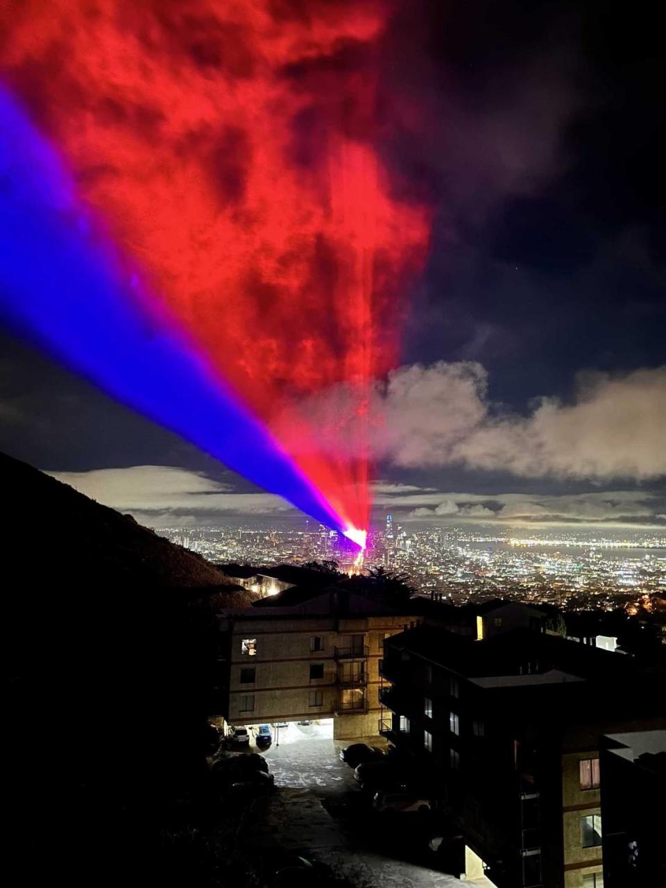 Red and blue beams of light are cast over San Francisco from downtown as part of a weeklong light show for the APEC summit. Nu-Salt Laser Light Shows International of Folsom partnered with Illuminate SF to create a weeklong light show for the APEC summit. Tim Henshaw Plath