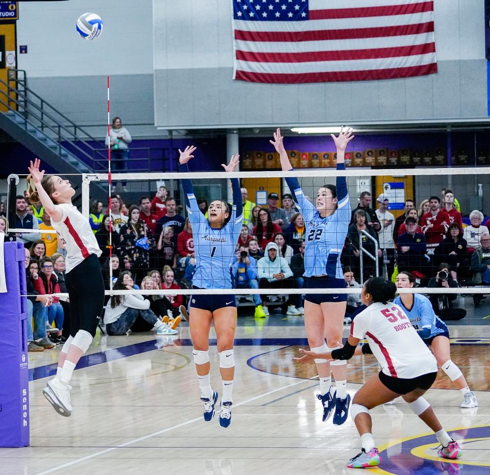 Wisconsin outside hitter Julia Orzol (22) prepares to spike the ball during a scrimmage against Marquette at Oconomowoc High School on March 31.