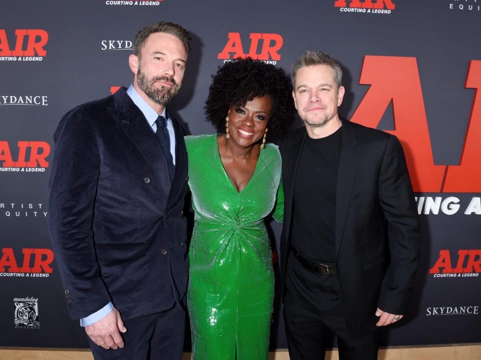 Ben Affleck, Viola Davis, and Matt Damon pose at the premiere of "AIR."