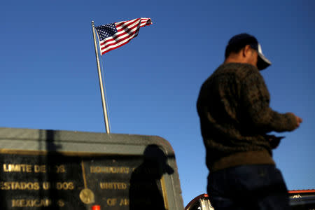 A commuter is seen while crossing to El Paso, Texas, on the international border crossing bridge Paso del Norte, in Ciudad Juarez, Mexico April 3, 2019. REUTERS/Jose Luis Gonzalez