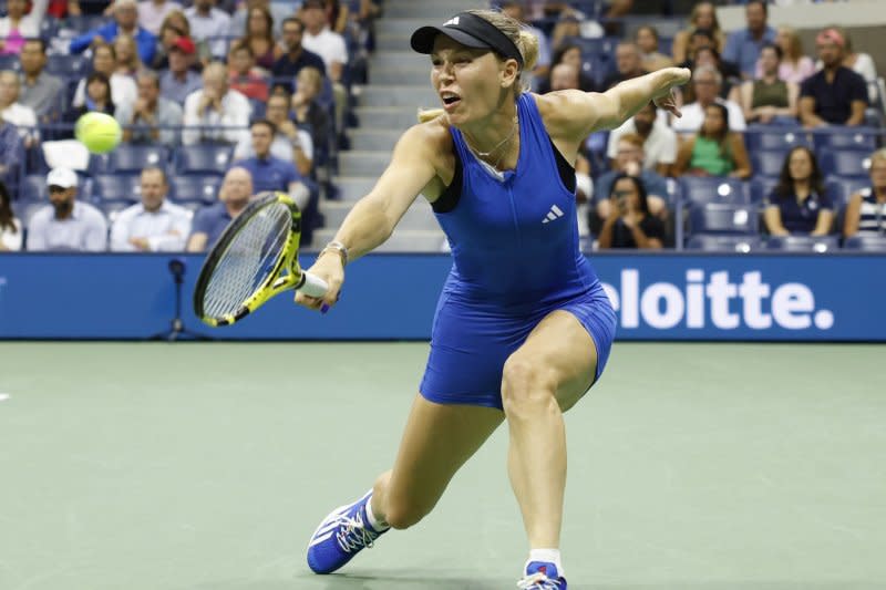 Caroline Wozniacki of Denmark returns a ball to Petra Kvitova of the Czech Republic in a second-round match at the 2023 U.S. Open at the USTA Billie Jean King National Tennis Center on Wednesday in Flushing, N.Y. Photo by John Angelillo/UPI