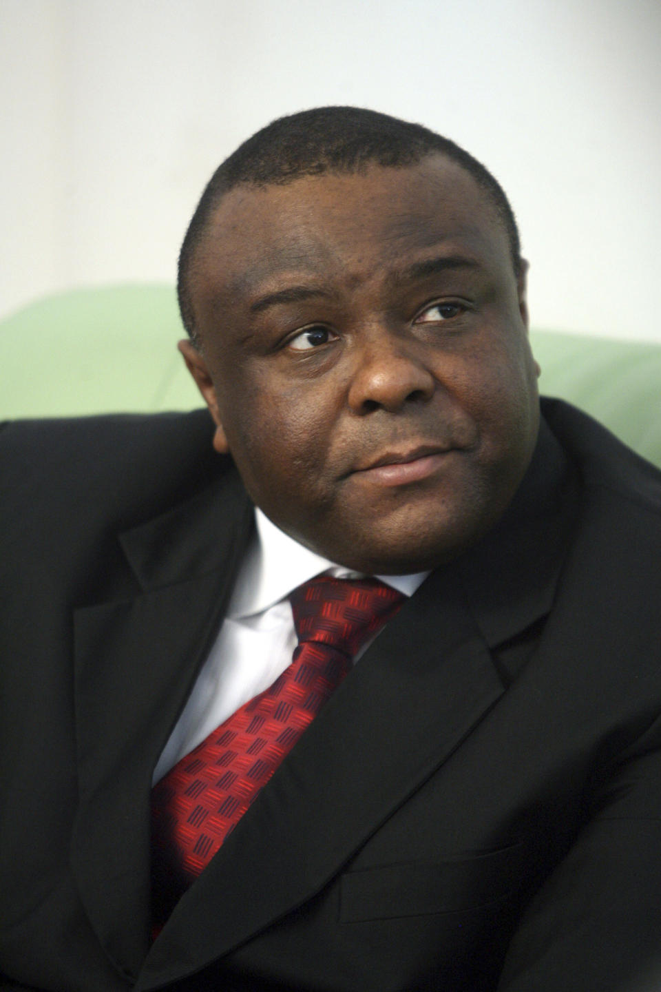 FILE- Former militia leader Jean Pierre Bemba holds a press conference in the Congoleses capital Kinshasa Oct. 26, 2006. Bemba was appointed as Congo's defense minister Thursday March 23, 2023, amid a cabinet reshuffle. (AP Photo/Jerome Delay, file)